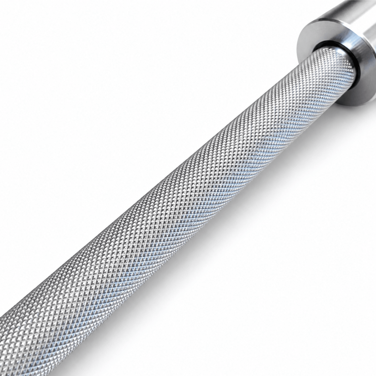 Close-up of aggressive volcanic knurling on the EYRIES Competition Barbell